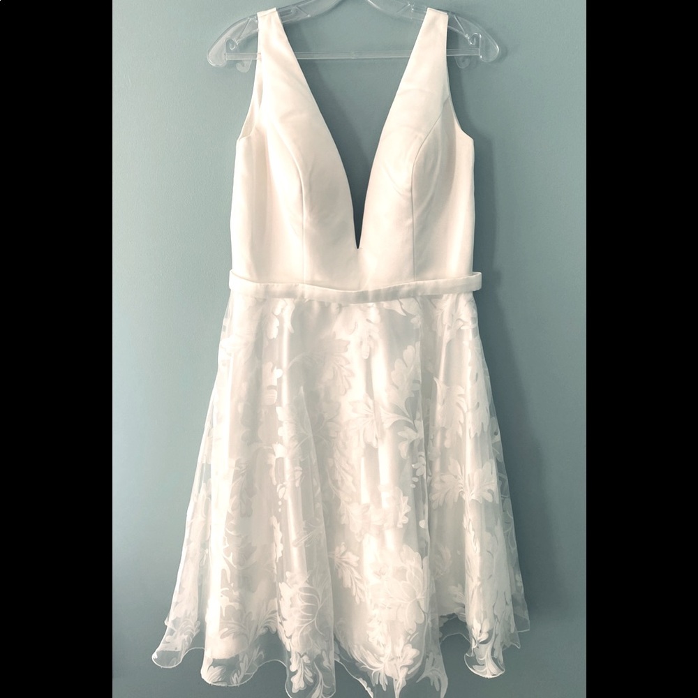 Never worn all white dress. Size 12. Brand Jovani.